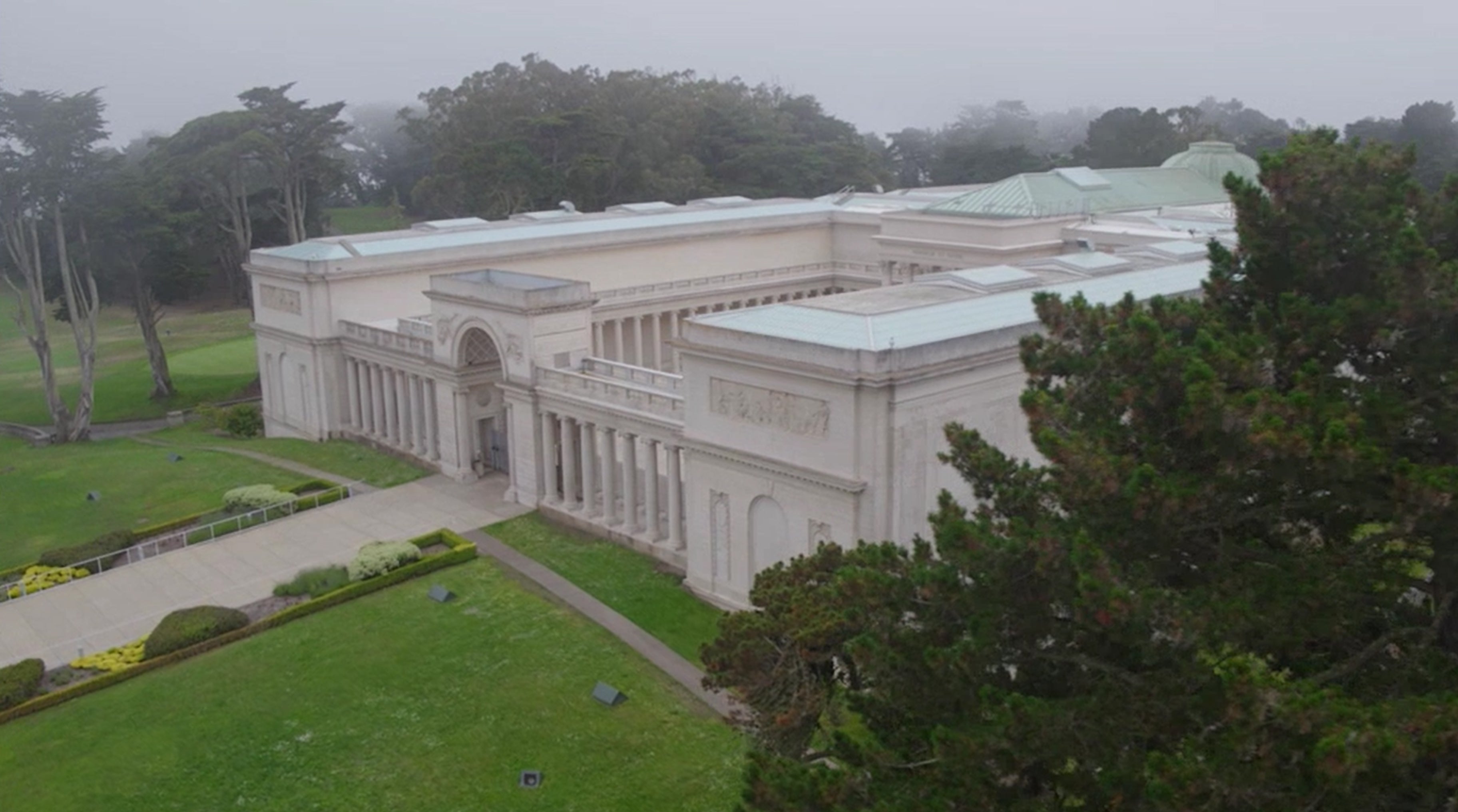 Drone footage showing the front of the Legion of Honor through the mist